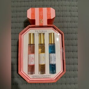 Victoria's Secret Bombshell Getaway Trio with Pink, Gold, and Blue Bottles